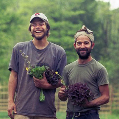 Andy and Joe harvesting vegetables