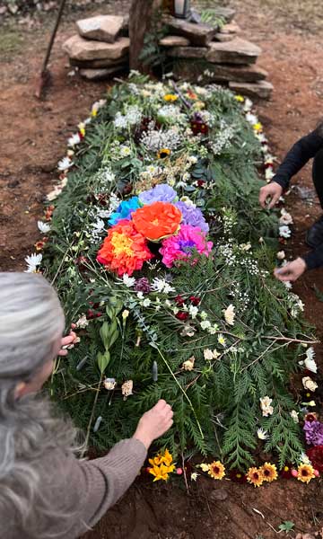 Decorating a grave with flowers