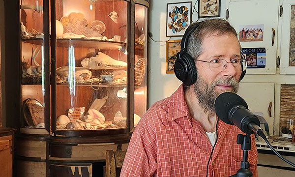 Storyteller Doug Elliott recording a podcast