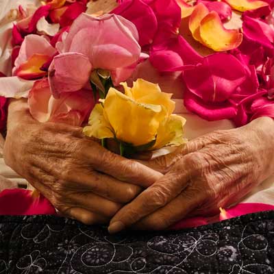 Hand with roses after death