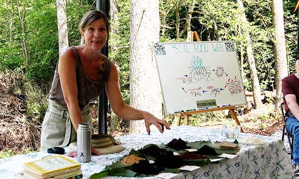 Dr. Monique Mazza with soil food web display
