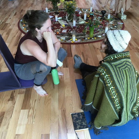 Two women talking at the retreat